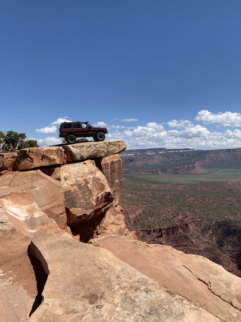 Weekend Jeep Guide to Moab, UT. Trail guides to Poison Spider Mesa and Top of the World, along with where to camp in Moab and what Jeep modifications to have in your Jeep xj for Moab // Hey There, Chelsie